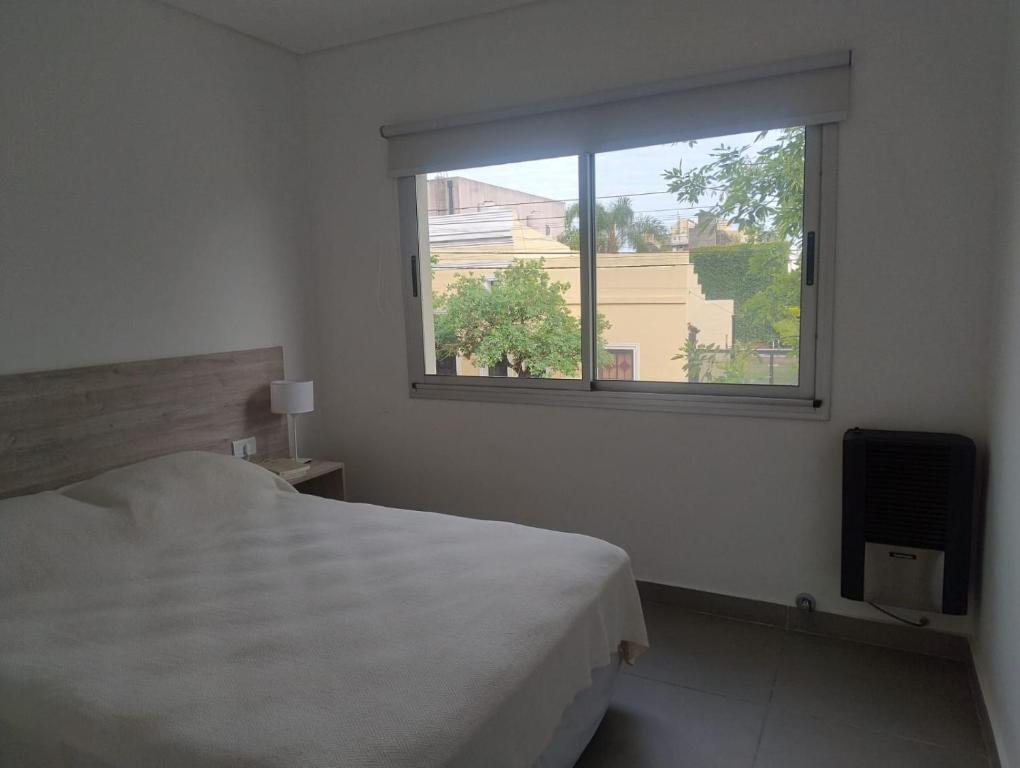 Ένα ή περισσότερα κρεβάτια σε δωμάτιο στο Altos deMoreno - solo familias o parejas