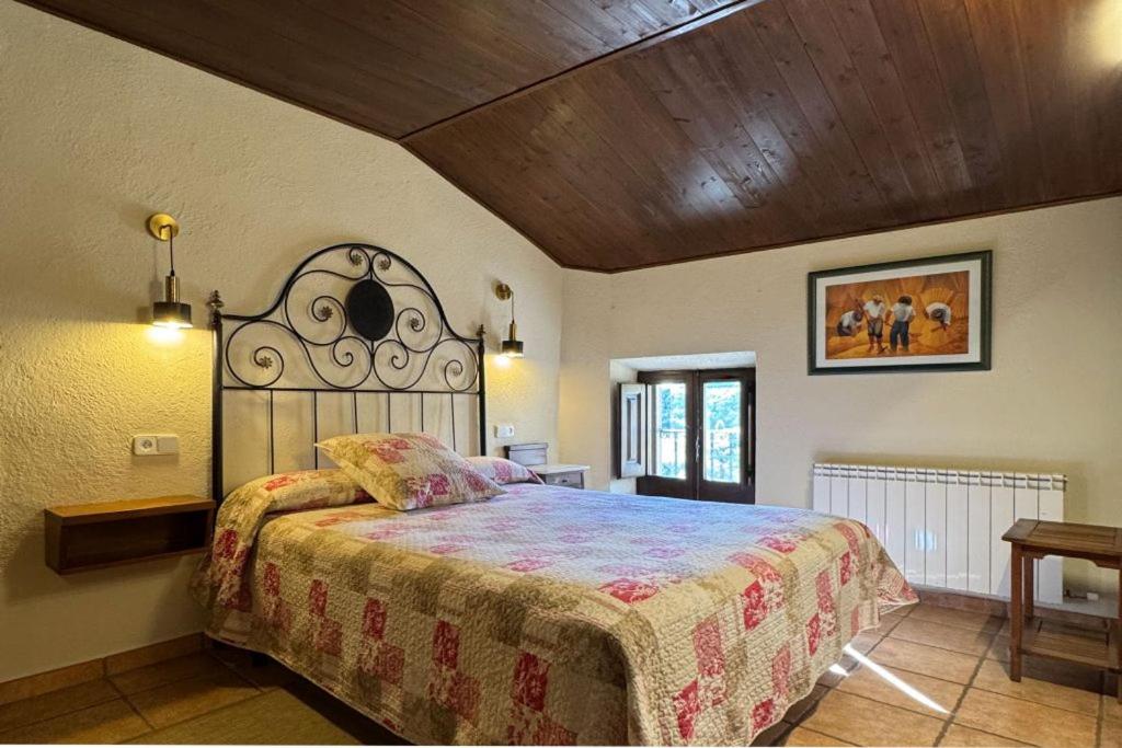 Ένα ή περισσότερα κρεβάτια σε δωμάτιο στο El Ventador de la Torra