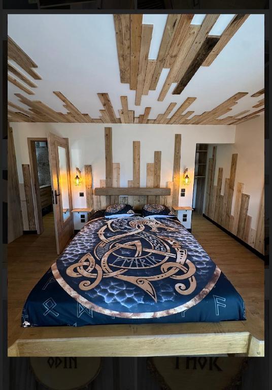 Voodi või voodid majutusasutuse Le valhalla vidar toas