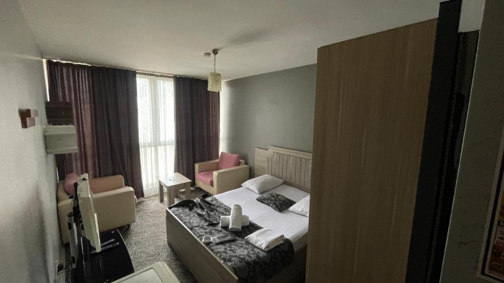 Ένα ή περισσότερα κρεβάτια σε δωμάτιο στο Beyhouse Konaklama