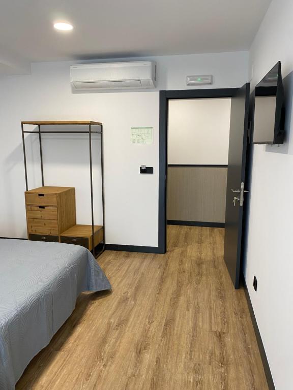 Ένα ή περισσότερα κρεβάτια σε δωμάτιο στο Casa Cancela