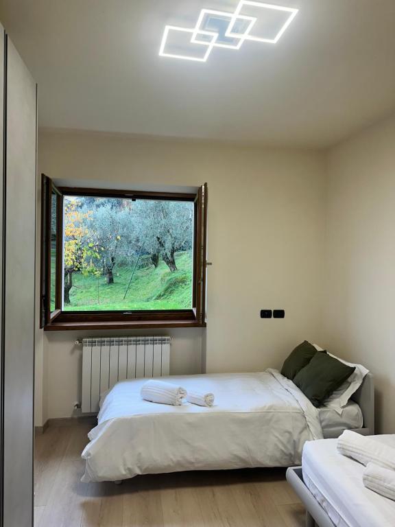 Ένα ή περισσότερα κρεβάτια σε δωμάτιο στο Casa L'Olivér