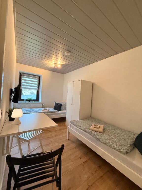 Ένα ή περισσότερα κρεβάτια σε δωμάτιο στο Mikro Apartment Großenhain