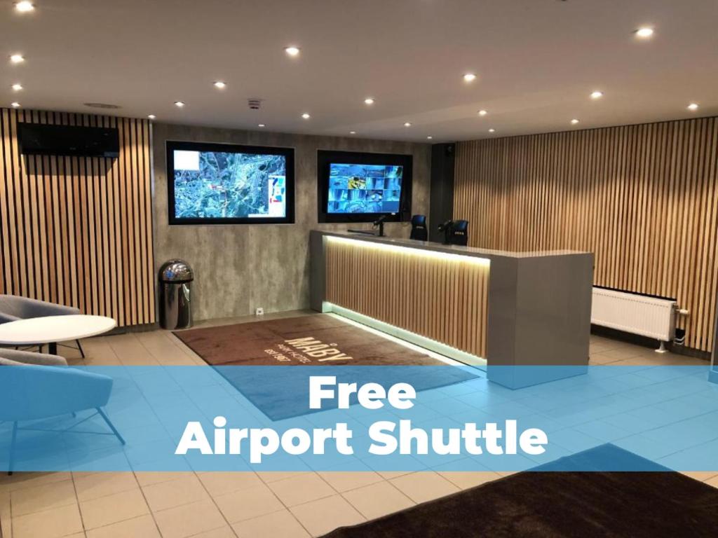 Un televizor și/sau centru de divertisment la Måby Park Hotel Arlanda