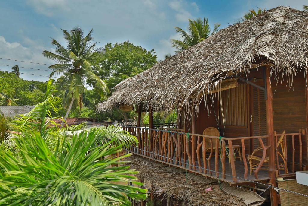 Zahrada ubytování Coco Palm Villa and Cabanas