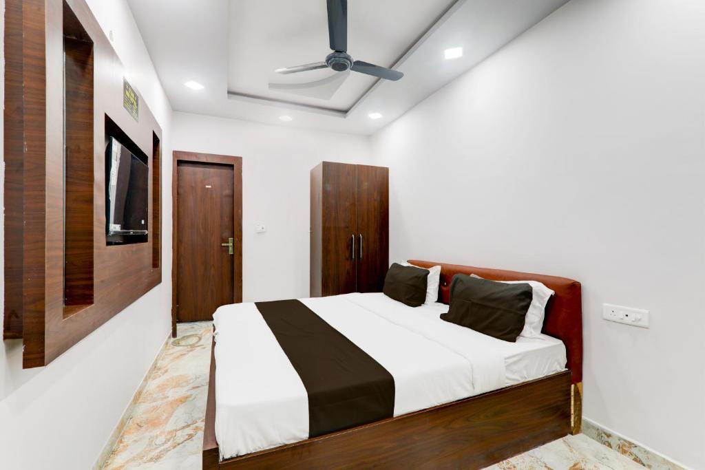 Ένα ή περισσότερα κρεβάτια σε δωμάτιο στο Hotel O Star Inn Hotel