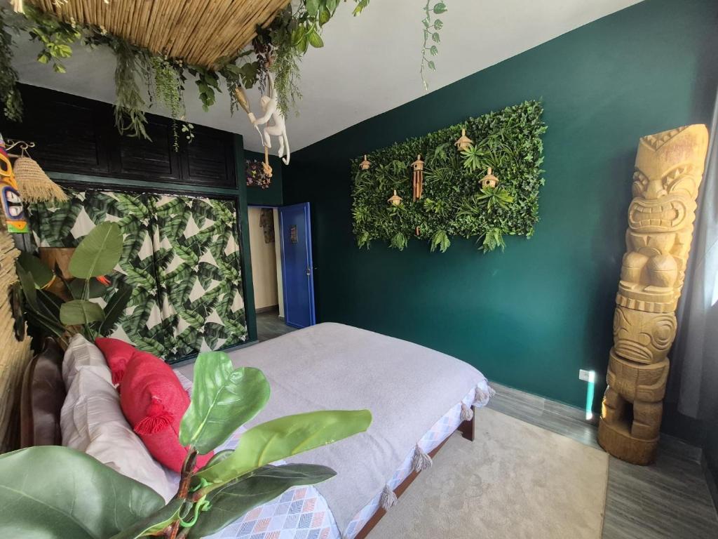 Ένα ή περισσότερα κρεβάτια σε δωμάτιο στο Maison Bleue