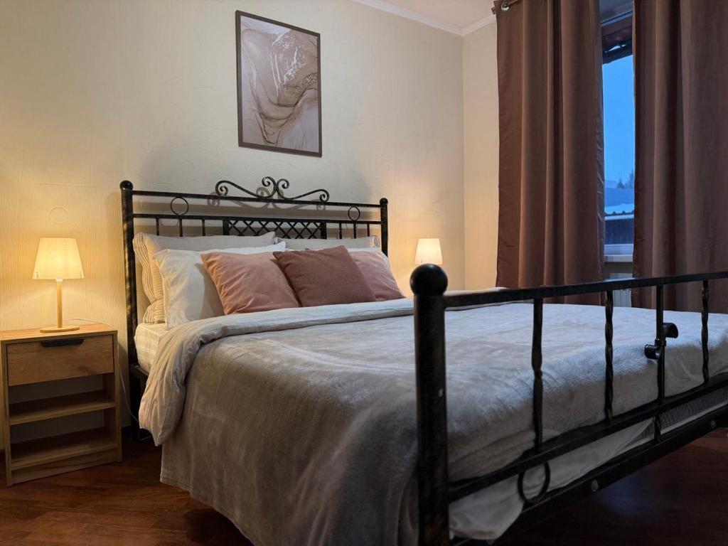 Ένα ή περισσότερα κρεβάτια σε δωμάτιο στο Home Boutique Hotel