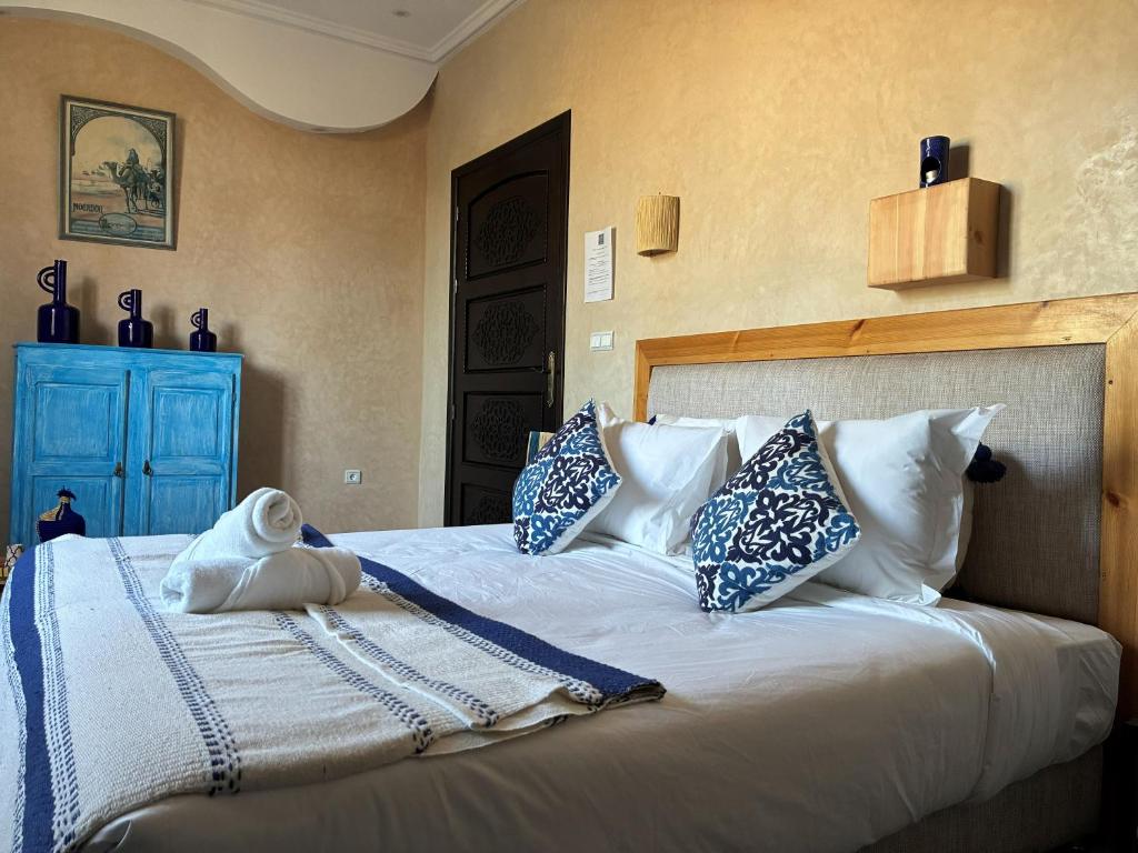 Ένα ή περισσότερα κρεβάτια σε δωμάτιο στο Dar Mimosa