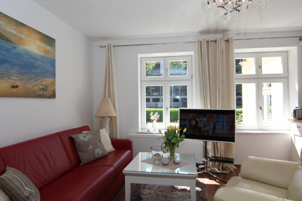 Телевизор и/или развлекательный центр в Brise Villa Emmi App 01