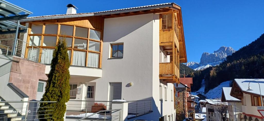 a house with a view of a mountain at Apartment Weber in Nova Levante