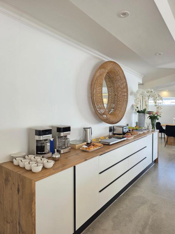 مطبخ أو مطبخ صغير في White Cottage Boutique Guesthouse