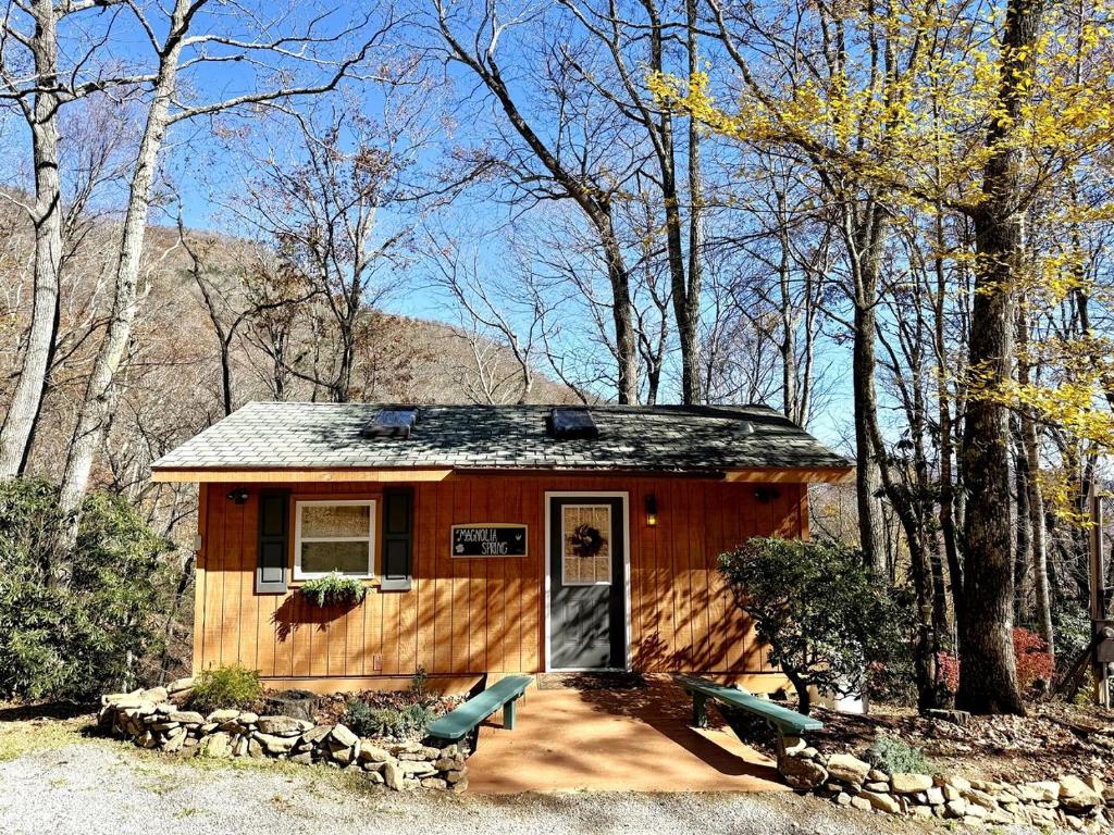 a tiny house in the middle of the woods at Secluded Mountain Cabin Retreat with Scenic Woodland Views near Black Mountain, NC in Montreat