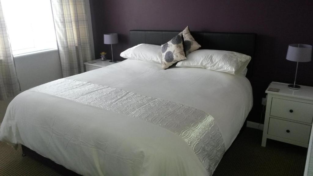 Postel nebo postele na pokoji v ubytování Premier Room