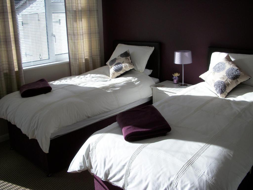 Postel nebo postele na pokoji v ubytování Premier Room