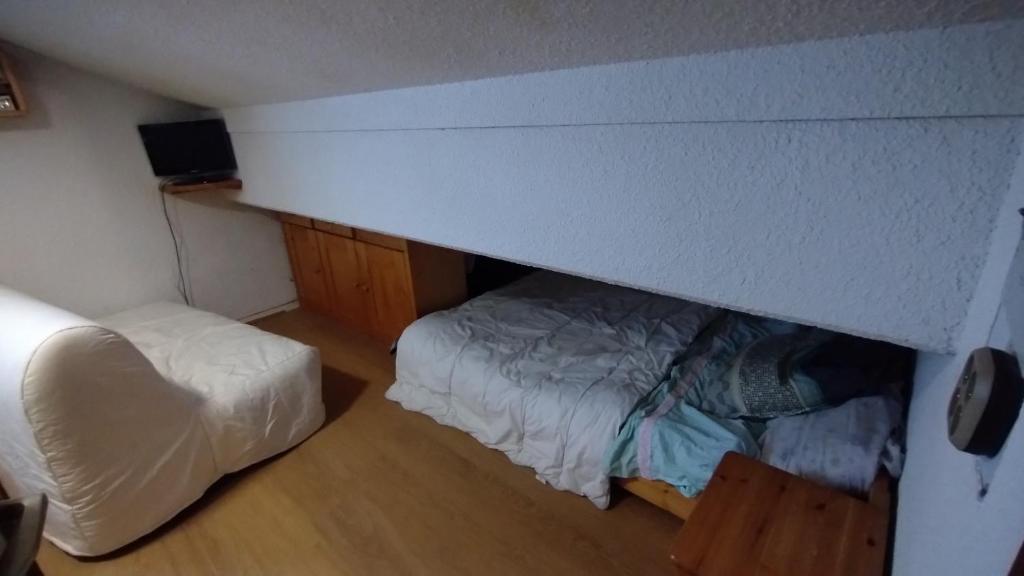 Ένα ή περισσότερα κρεβάτια σε δωμάτιο στο Studio 4 personnes pied des pistes