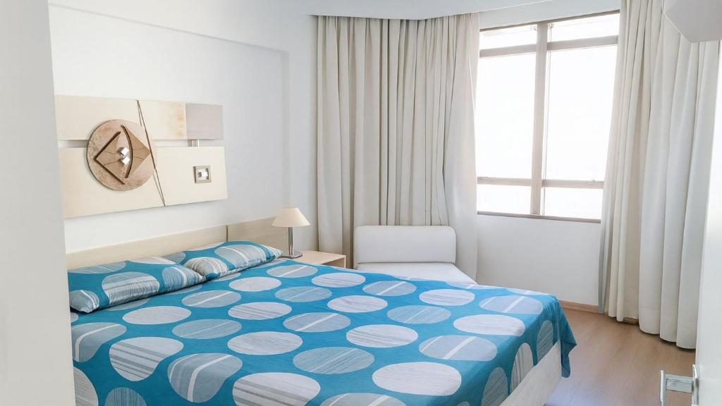 En eller flere senge i et værelse på Campinas - Conforto e Praticidade: 02 Hóspedes