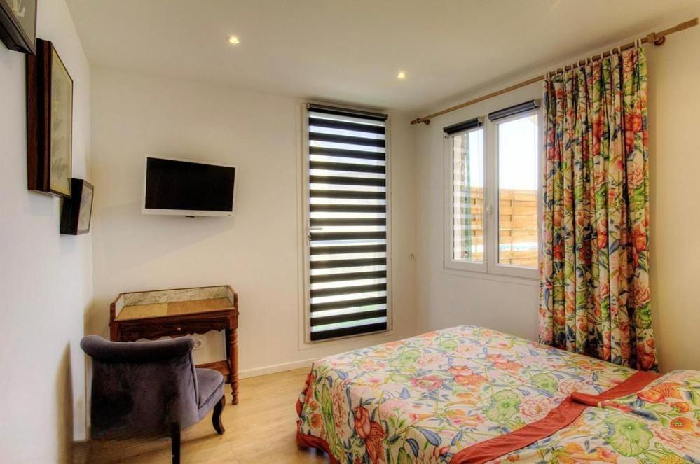 Postel nebo postele na pokoji v ubytování Face à la mer - Grande terrasse