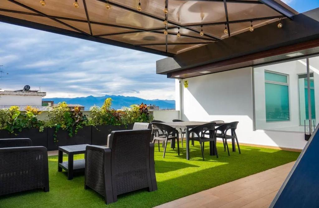 Et opholdsområde på Modern and Central Suite in Ibarra