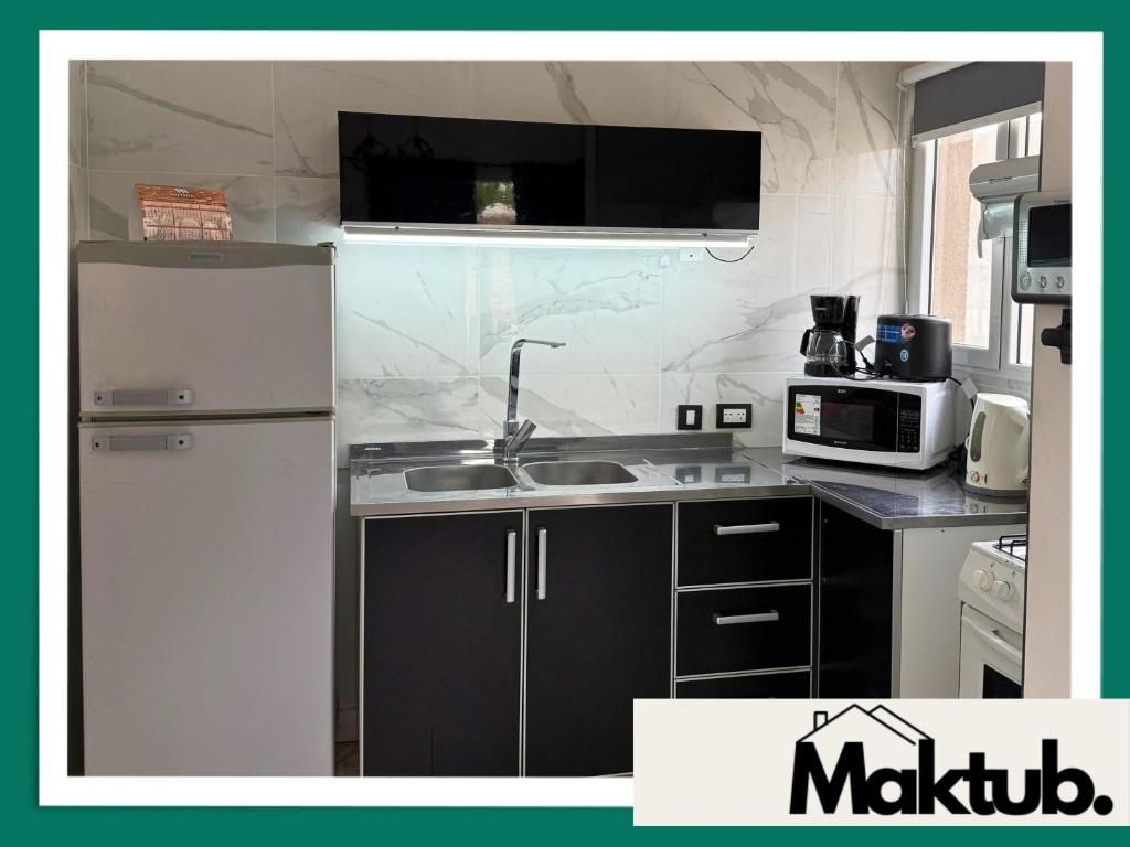 Køkken eller tekøkken på Maktub Alojamiento