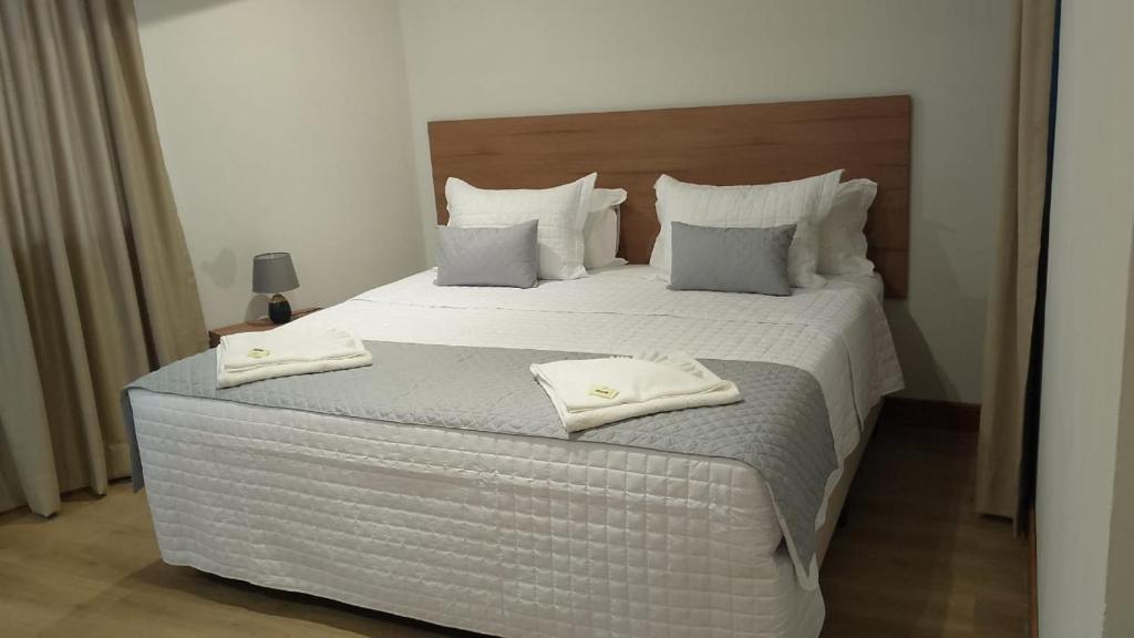 Postel nebo postele na pokoji v ubytování Amazon Seasons hotel