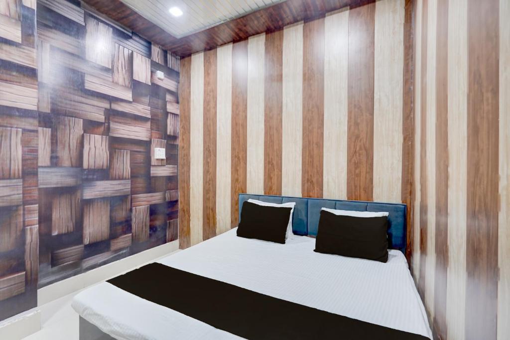 Ένα ή περισσότερα κρεβάτια σε δωμάτιο στο SPOT ON The Yeble Hotel And Restaurant