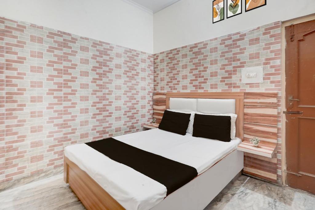 Ένα ή περισσότερα κρεβάτια σε δωμάτιο στο Hotel O prream view