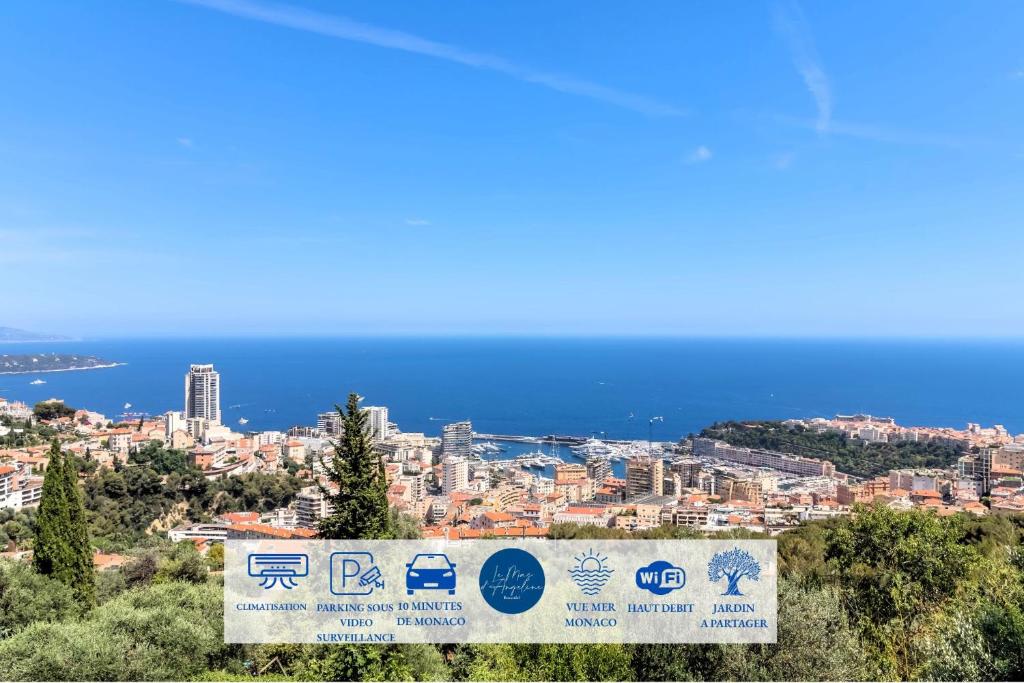 uitzicht op een stad vanaf een heuvel bij Le Mas d'Angeline-Vue mer panoramique, jardin partagé, parking, voiture indispensable, route étroite et pentue, à 10 min de Monaco in Beausoleil