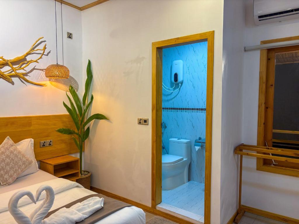Un baño de Eco Palm Maldives