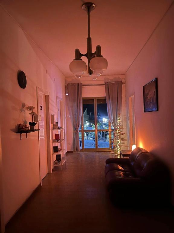 a living room with a couch and a christmas tree at Bed & Breakfast Villa Emma in Paterno