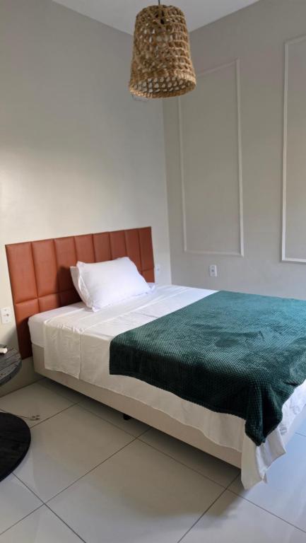 En eller flere senge i et værelse på Vida & Brisa