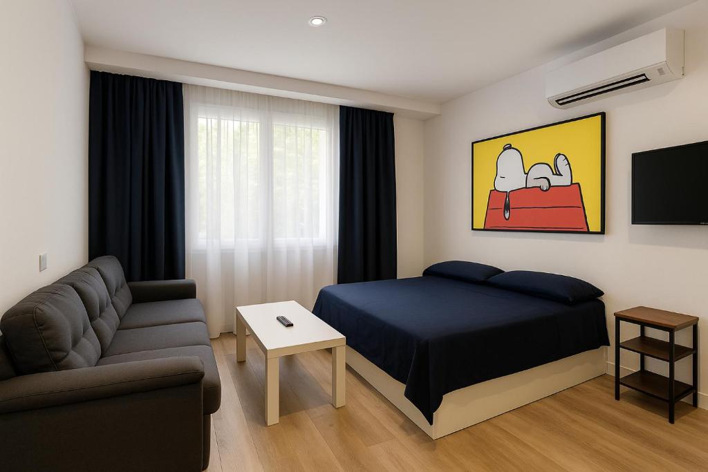 Ένα ή περισσότερα κρεβάτια σε δωμάτιο στο Loft Snoopy con Netflix y wifi