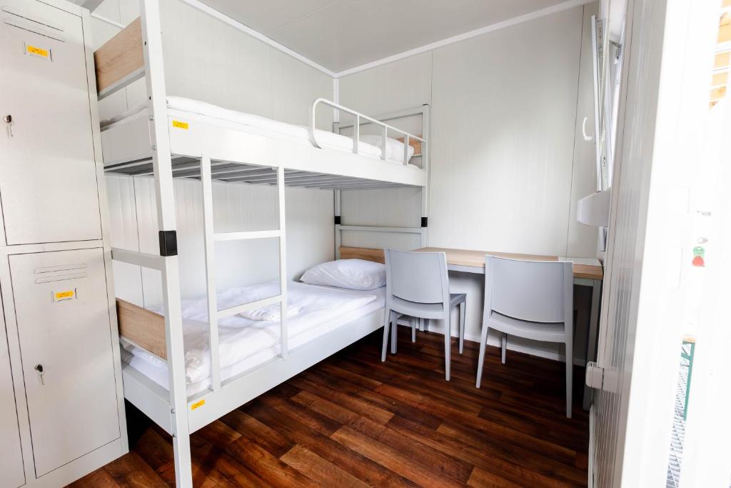 Ένα ή περισσότερα κρεβάτια σε δωμάτιο στο LYNX PRO - Basecamp units