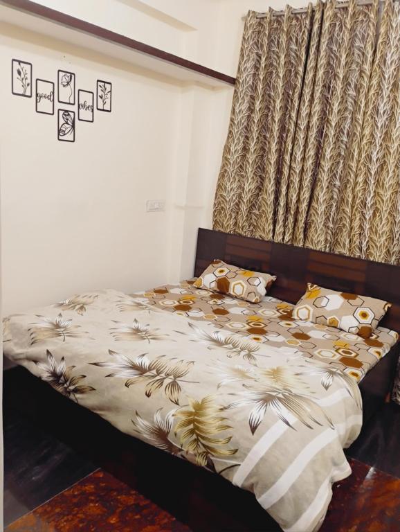 Ένα ή περισσότερα κρεβάτια σε δωμάτιο στο MiRACLE HOMESTAY