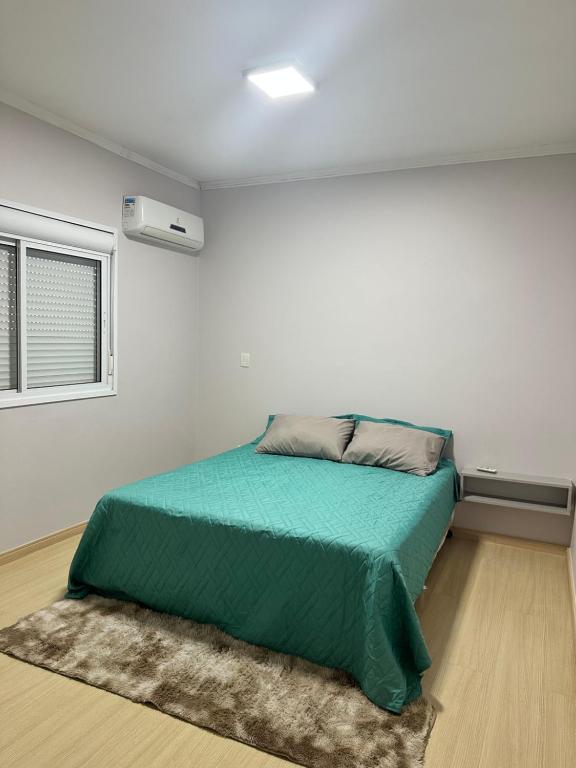 Postel nebo postele na pokoji v ubytování Ap Independecia