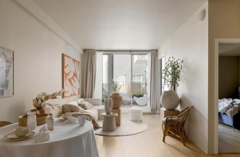 Et opholdsområde på Luxurious and super central apartment with balcony