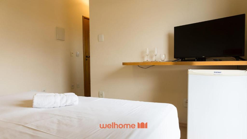 Et tv og/eller underholdning på Apartamento Serra Negra Proximo ao Parque Represa