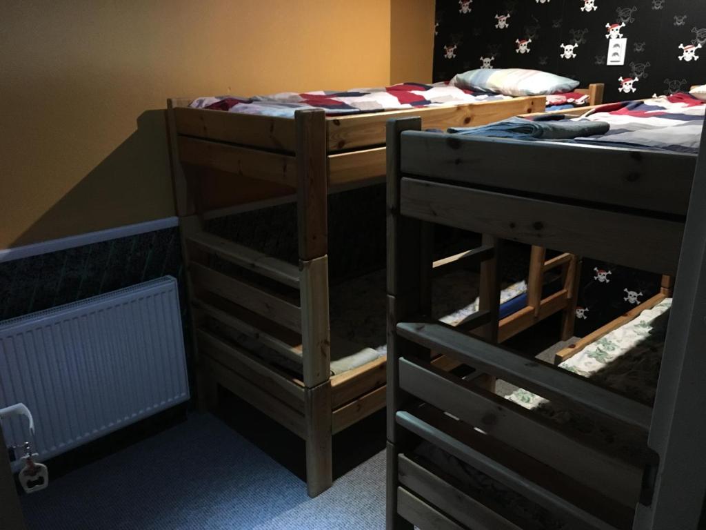 Postel nebo postele na pokoji v ubytování Tolli Hostel & Holiday House