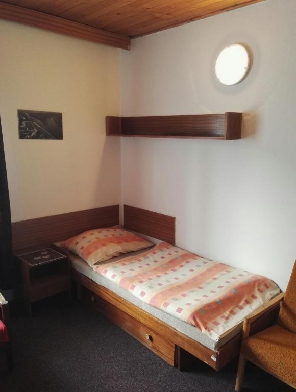 Postel nebo postele na pokoji v ubytování Penzion Tenis
