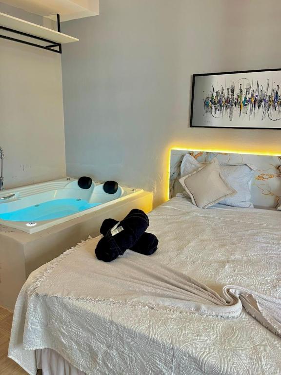 Postel nebo postele na pokoji v ubytování 1155 golden 55m2 1 quarto frente mar avenida beira mar