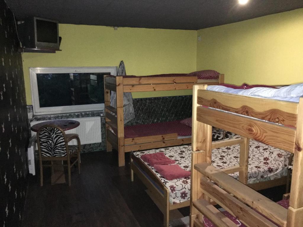 Postel nebo postele na pokoji v ubytování Tolli Hostel & Holiday House