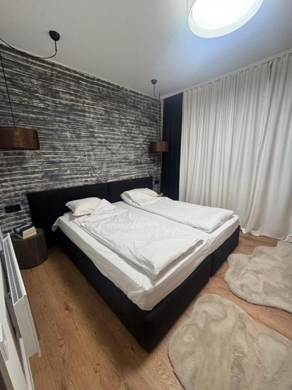 Postel nebo postele na pokoji v ubytování Monastery 2 Private Apartments