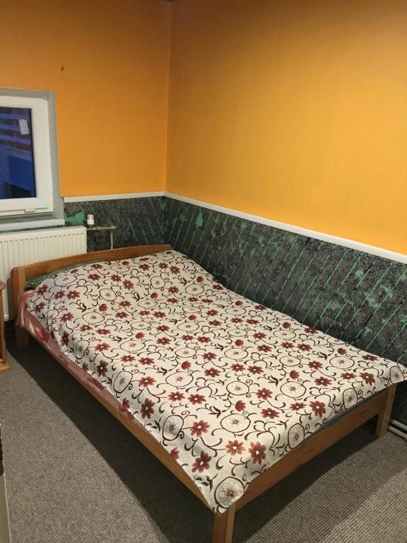 Postel nebo postele na pokoji v ubytování Tolli Hostel & Holiday House