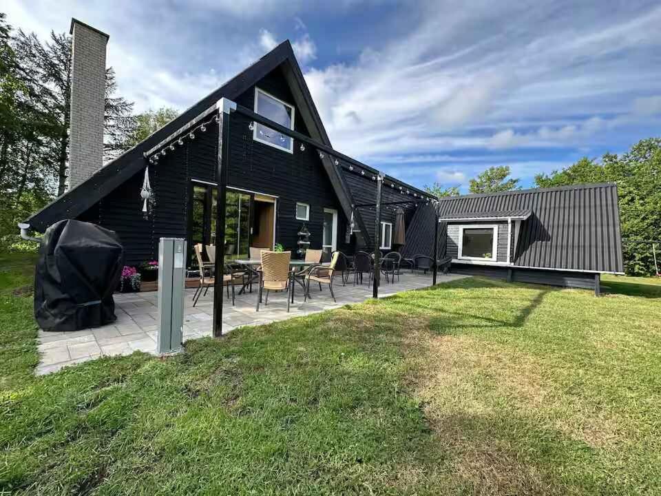 Сад в Sommerhus Med Spa, Sauna Og Vildmarksbad
