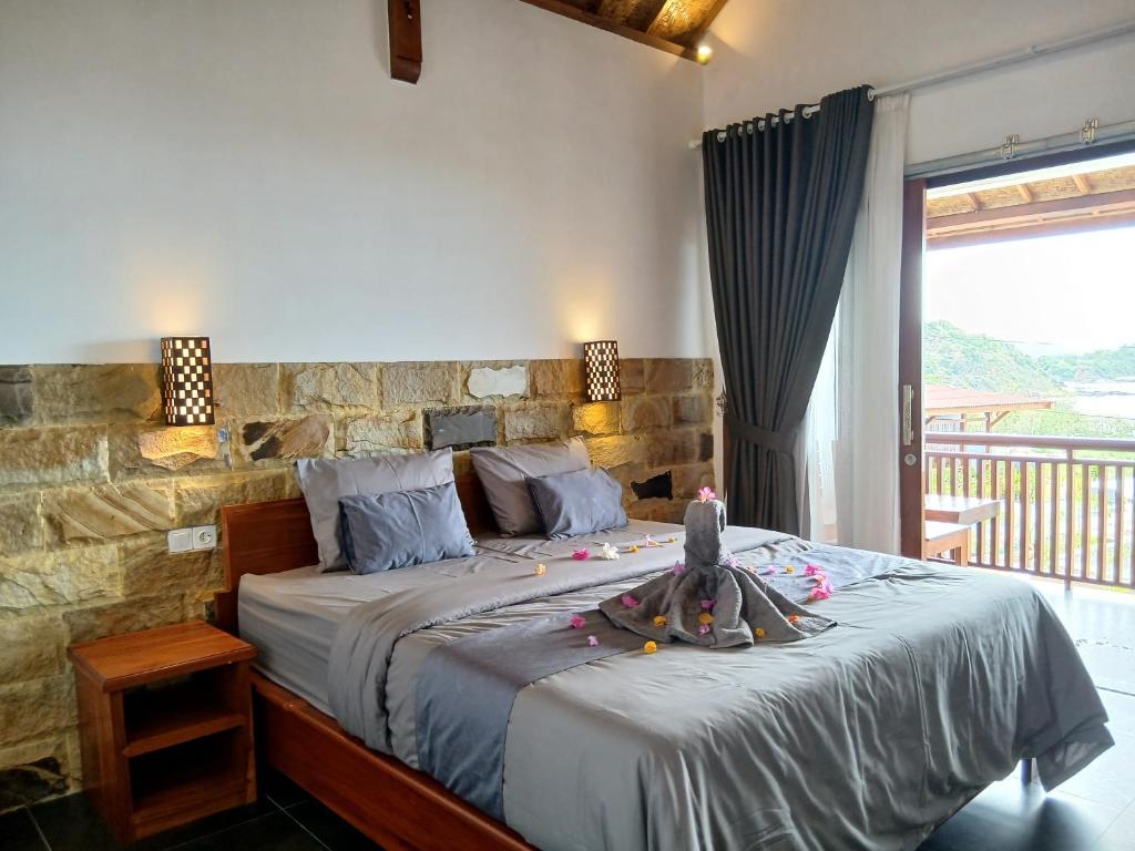 Ένα ή περισσότερα κρεβάτια σε δωμάτιο στο Lafrin Brothers