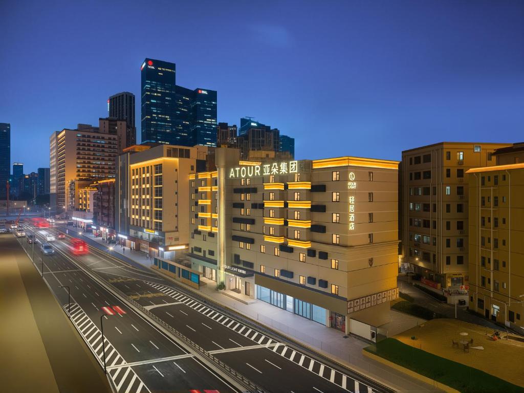a view of a city street with buildings and traffic at Atour Light Hotel Shenzhen North Station East Plaza in Lung Wa