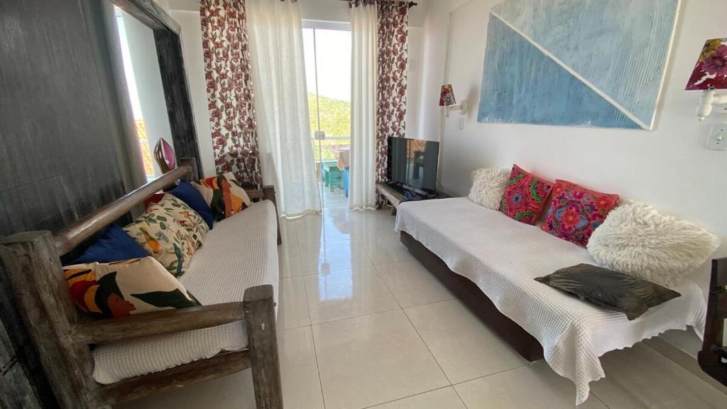 Khu vực ghế ngồi tại Apartamento Vista Mar até 4 hóspedes