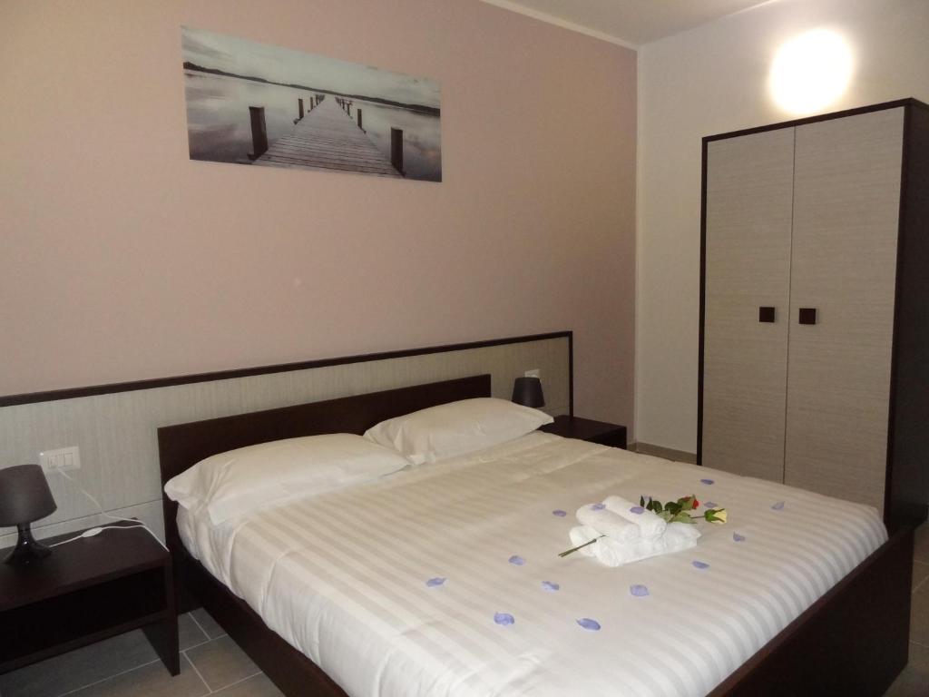 Letto o letti in una camera di Affittacamere Rooms Di Matteo