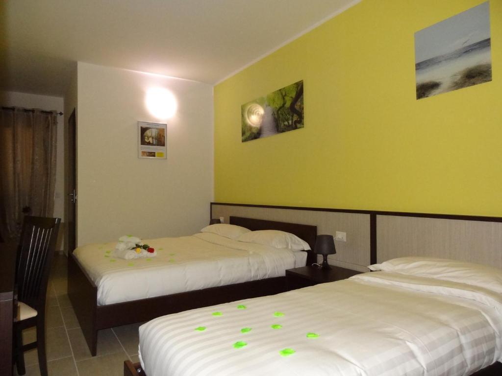 Letto o letti in una camera di Affittacamere Rooms Di Matteo