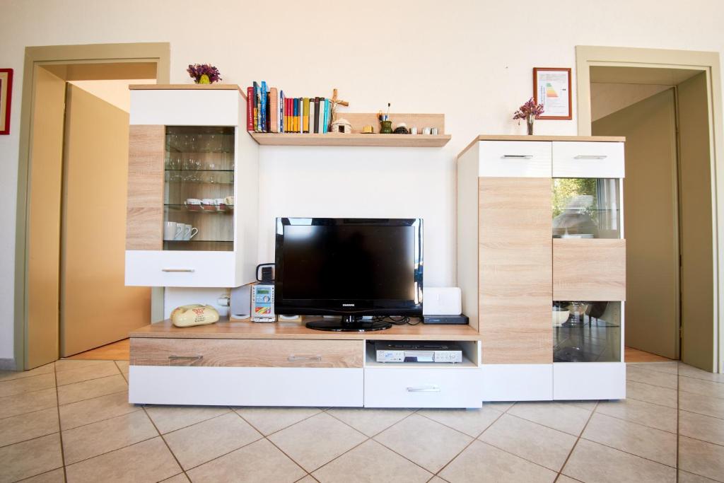 TV a/nebo společenská místnost v ubytování Kuća Gašpar